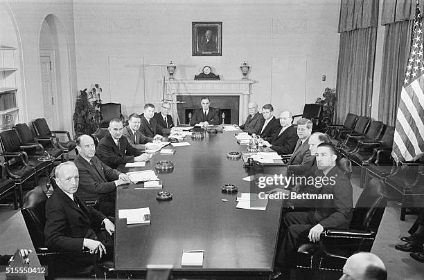 President John F. Kennedy poses with his cabinet at the White House. Left to right are Edward Day, Postmaster General; Adlai Stevenson, UN...
