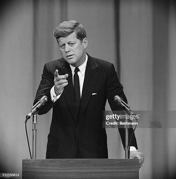 Closeup of Kennedy. Washington: President Kennedy gestures today during the beginning of his first Press Conference since taking office. During the...