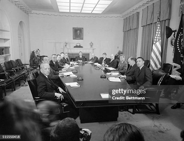 President John F. Kennedy poses with his cabinet at the White House. Left to right are Edward Day, Postmaster General; Vice President Lyndon B....