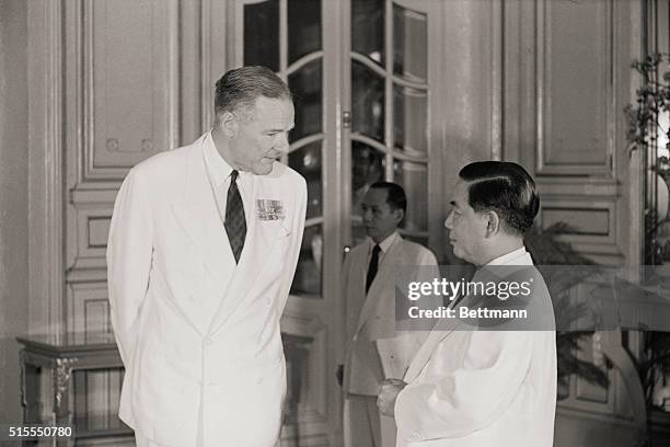 Saigon, South Vietnam: United States Ambassador Henry Cabot Lodge presents credentials to South Vietnamese President Ngo Dinh Diem at Presidential...