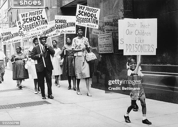 The St. Louis Board of Education was picketed by the NAACP after the Board issued a modified enrollment plan which the NAACP did not go far enough in...