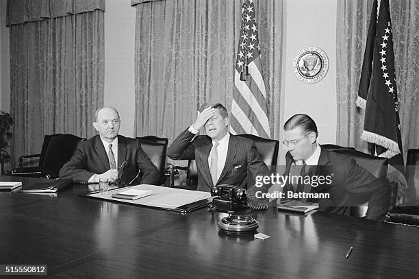 Kennedy Meets with Key Advisers. Washington: President Kennedy and his key advisers tackled plans today for adjusting US defense strength to the...