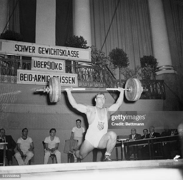 Norbert Schemansky, of Detroit, winner of the Heavyweight World Championship in the recent international weightlifting competition in Viena, is shown...
