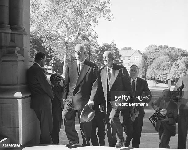 Chief Justice Earl Warren, left, Associate Justice Hugo L. Black, center, and William O. Douglas are shown as they arrived at Washington National...