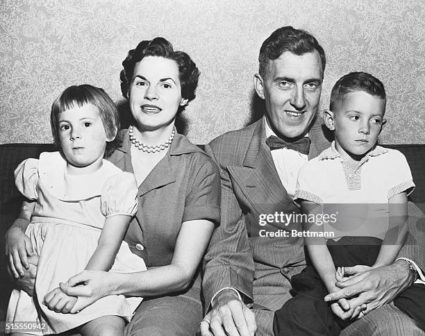 Governor-elect Edmund S. Muskie of Maine and Mrs. Muskie sit proudly with their two children, Ellen and Stephen, 5 1/2. Mrs. Muskie, at 27 the...