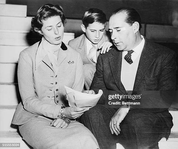 Actress Ingrid Bergman and her husband, director Roberto Rossellini go over the script of the dramatic opera Joan of Arc at the stake in which Miss...