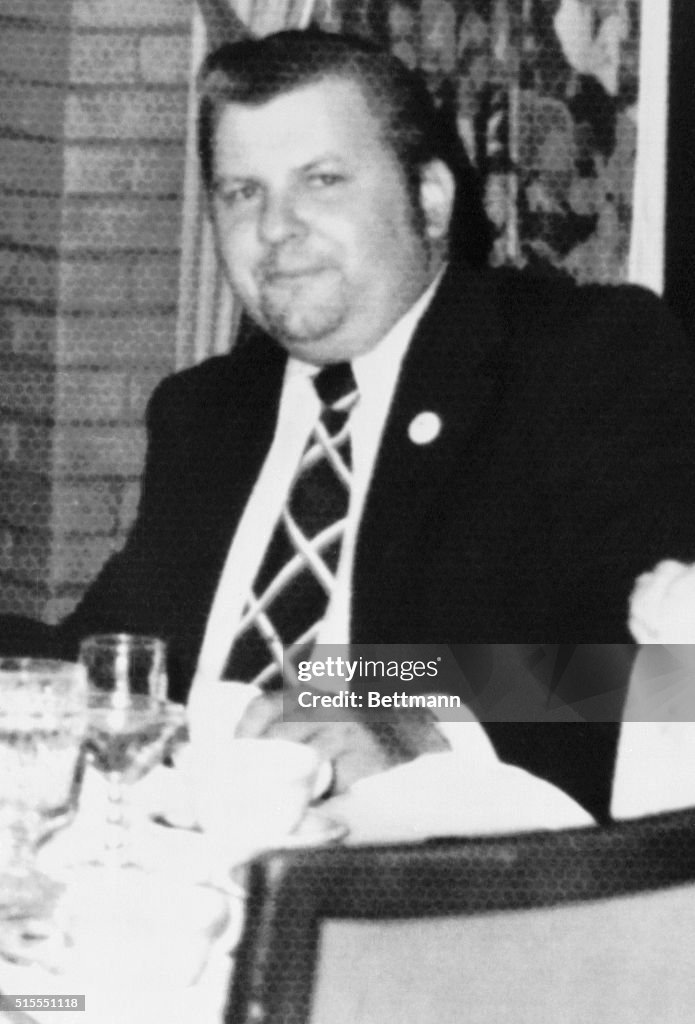 Serial Killer Seated at Table