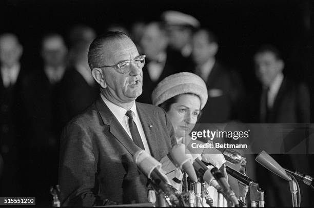 Pres. Lyndon B. Johnson, with Ladybird at his side, makes his first personal statement to the nation as President following his arrival from Dallas...