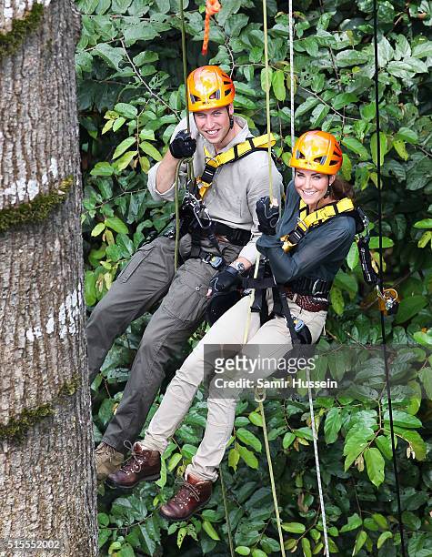 Prince William, Duke of Cambride and Catherine, Duchess of Cambridge abseil through the rainforest in Danum Valley Research Center in Danum Valley on...