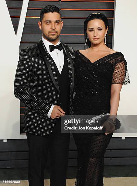 Actor Wilmer Valderrama and singer Demi Lovato arrive at the 2016 Vanity Fair Oscar Party Hosted By Graydon Carter at Wallis Annenberg Center for the...