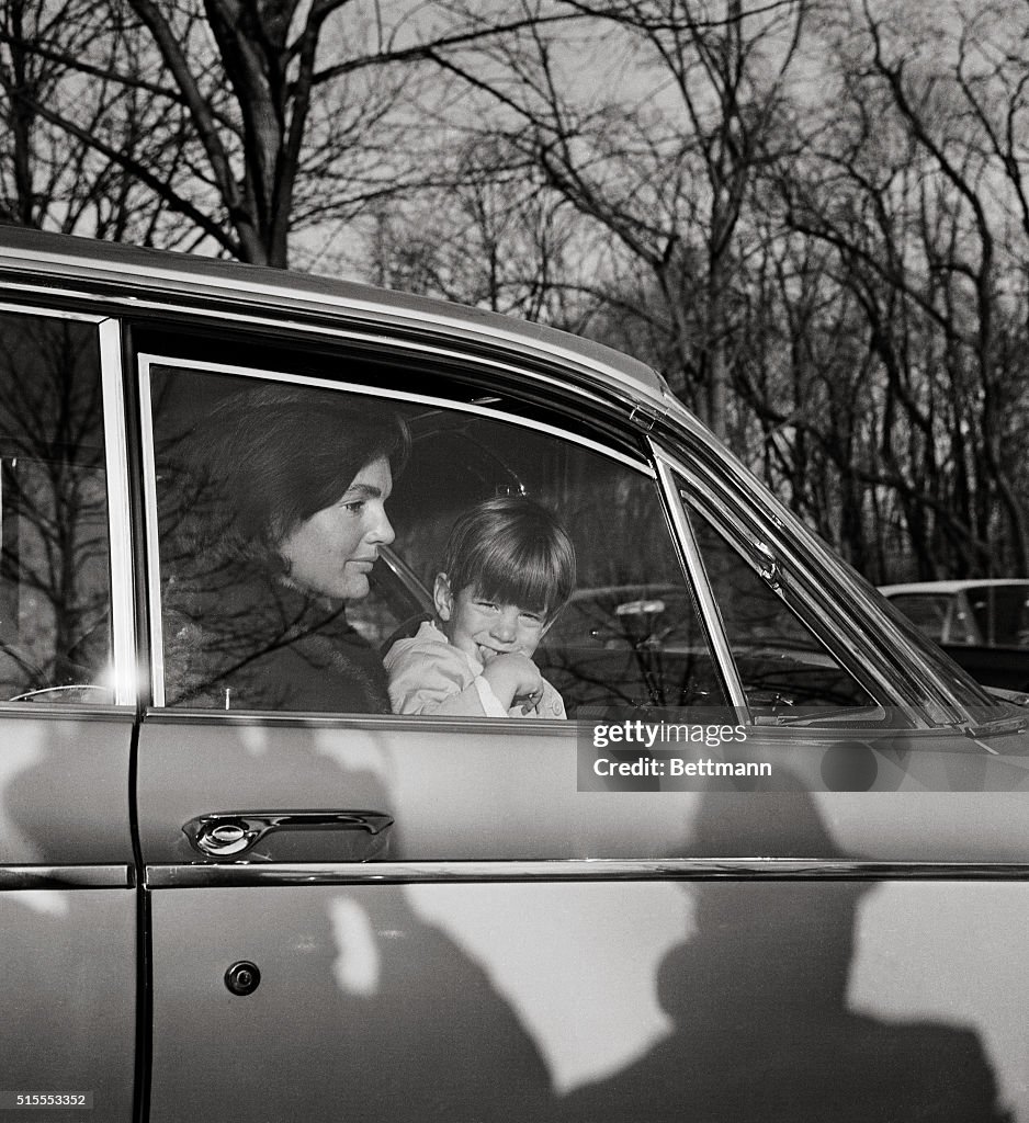 Jacqueline Bouvier Kennedy with John F. Kennedy Jr. in Limousine