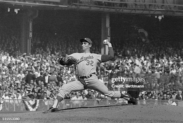 Los Angeles Dodgers star pitcher Sandy Koufax shows his winning form in the first inning of the World Series opener, won by the Dodgers over the New...