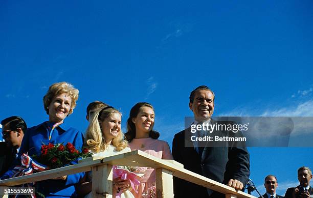 El Paso, Texas: Republican Presidential candidate Richard Nixon , introduces his family to an airport crowd on his arrival here for a rally. Nixon...