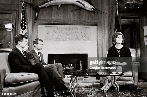 Mrs. John F. Kennedy, waits with her brothers-in-law, Senator Edward Kennedy, D-Mass., and Attorney General Robert F. Kennedy, , in the latter's...