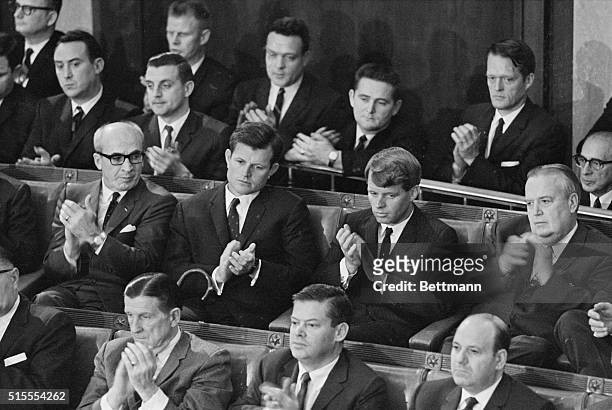 Listening intently as President Johnson addresses a joint session of Congress are, left to right: Attorney General Robert F. Kennedy; Interior...