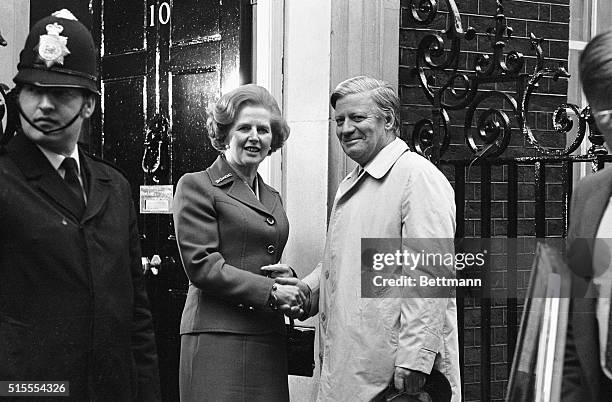 London, England- Prime Minister, Margaret Thatcher, welcomes West German Chancellor, Helmut Schmidt, to 10 Downing Street. It was Mrs. Thatcher's...