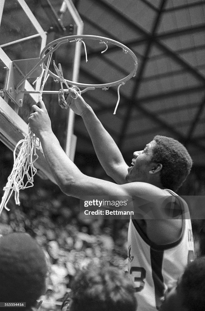 Earvin "Magic" Johnson Cutting Net from Hoop