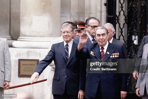 Vienna, Austria: Leonid Brezhnev with Jimmy Carter outside the US Embassy during SALT II treaty session.