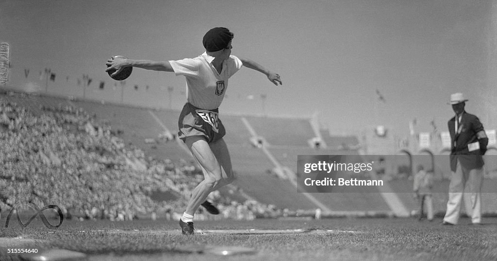 Stella Walsh Performing with Discus at The Los Angeles Olympics