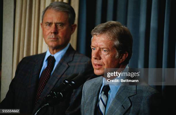 Washington: President Carter with Secretary of State Cyrus Vance announced 6/7, that he has decided to maintain sanctions against Zimbabwe Rhodesia...