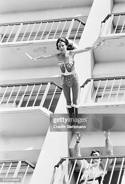 Hollywood, Calif.: Stunt woman Kitty O'Neil's face mirrors the strain of stunt she is performing for the TV show Wonderwoman. The script calls for...