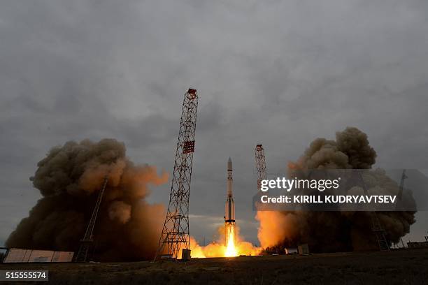 Russian Proton-M rocket carrying the ExoMars 2016 spacecraft blasts off from the launch pad at the Russian-leased Baikonur cosmodrome on March 14,...