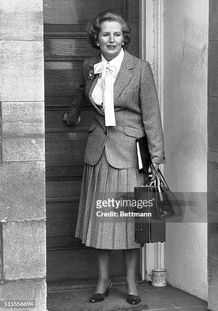 London, England- Margaret Thatcher, leader of Britain's Conservative Party, leaves home en route to Parliament for a session in which the Prime...