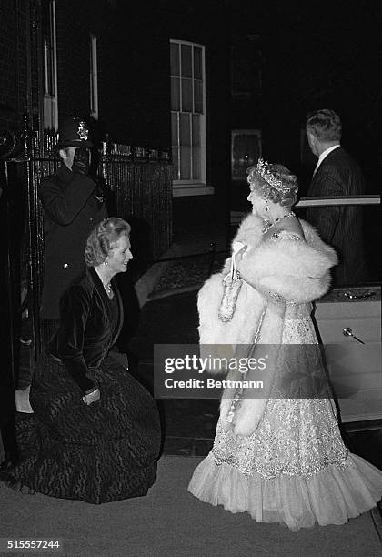 London, England- Britain's Queen Mother is greeted by the Prime Minister, Margaret Thatcher, upon her arrival at 10 Downing Street. The Prime...