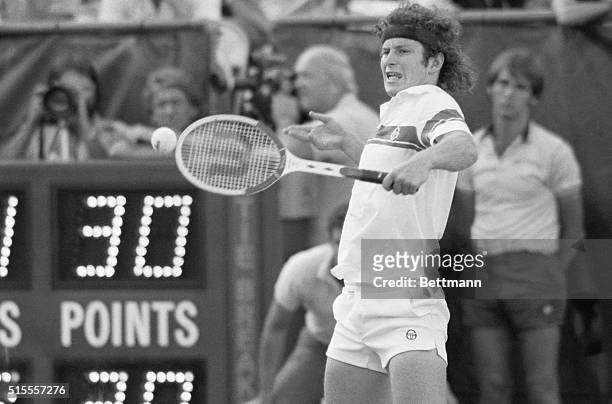 John McEnroe backhands one to Bjorn Borg during their US Open Tennis Championship match here 9/7.