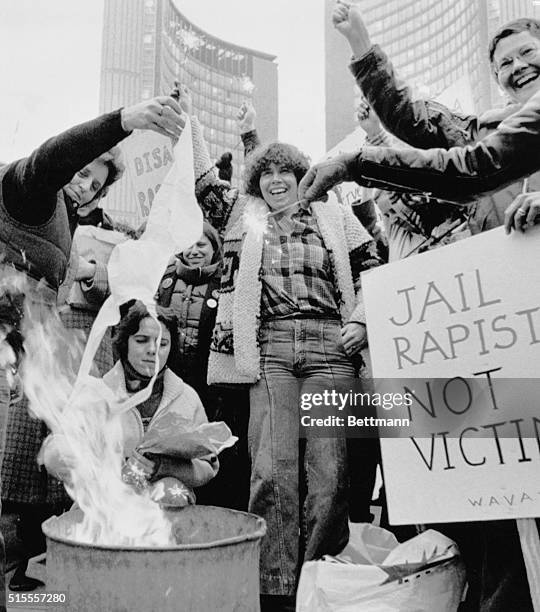 Canadian women marked International Women's Day across the nation. Here at Toronto City Hall they burned a bra and protested against rape, abortion,...