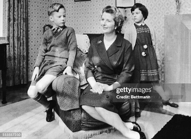 Mrs. Margaret Thatcher, MP, for Finchley and leader of the Conservative Party, seen with her two children in a 1961 file photo.