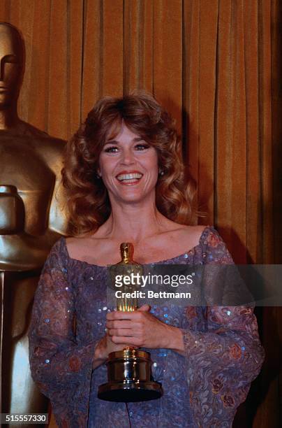 Hollywood, California: Actress Jane Fonda wears a giant smile as she holds her Oscar, won as the best actress in a leading role for her role in...
