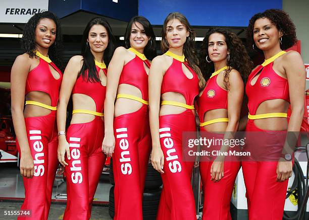 The Shell V-Power girls pose for photographers prior to the Formula One Brazilian Grand Prix at Interlagos on October 24, 2004 in Sao Paulo, Barzil.