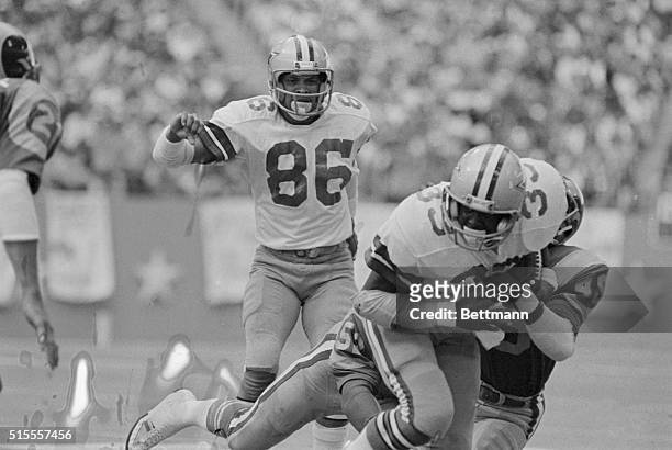 Irving, Tex: The Dallas Cowboys Tony Dorsett drives through a maze of L.A. Rams arms for a short gain during 3rd quarter action in the Cowboys 34-13...