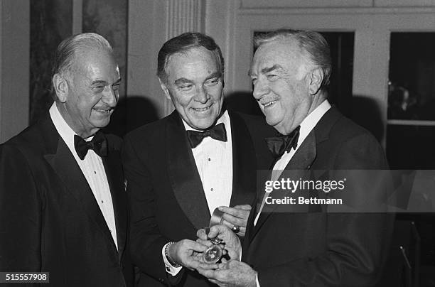 Secretary of State Alexander Haig presents veteran newsman Walter Cronkite with Charles Even Hughes Gold Medal of National Conference of Christians...