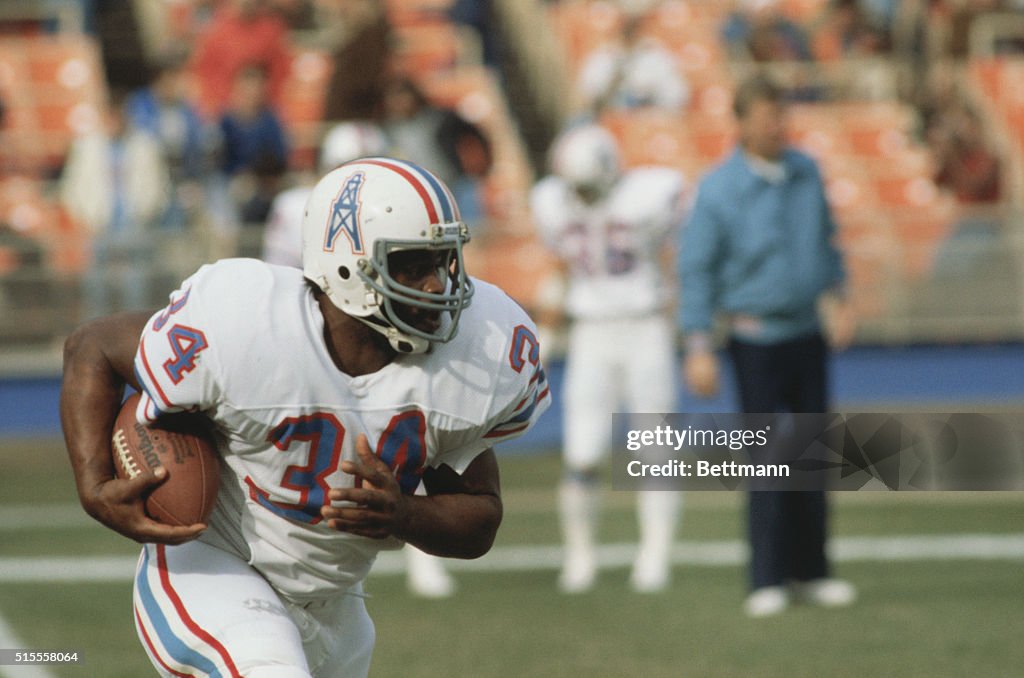 Earl Campbell Running with Football