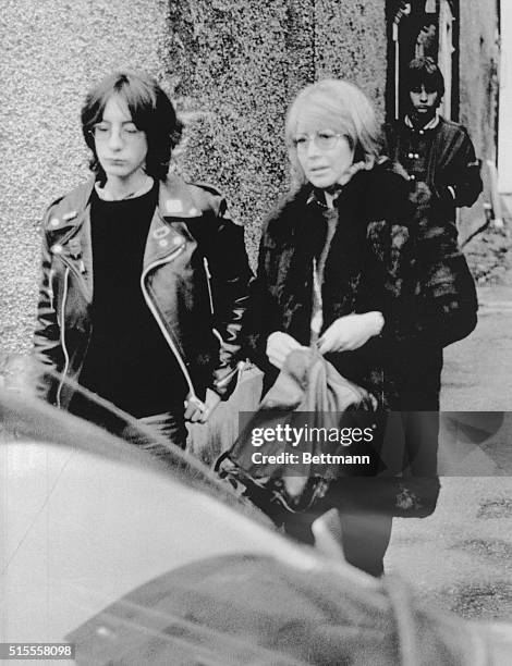 John Lennon's first wife, Cynthia, and their 17-year-old son, Julian, leave their home here Dec. 9 for an undisclosed destination.