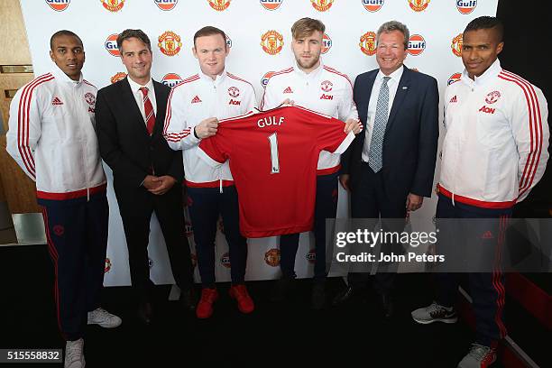 Ashley Young, Manchester United commercial director Jamie Reigle, Wayne Rooney, Luke Shaw, Gulf Oil International vice president Frank Rutten and...