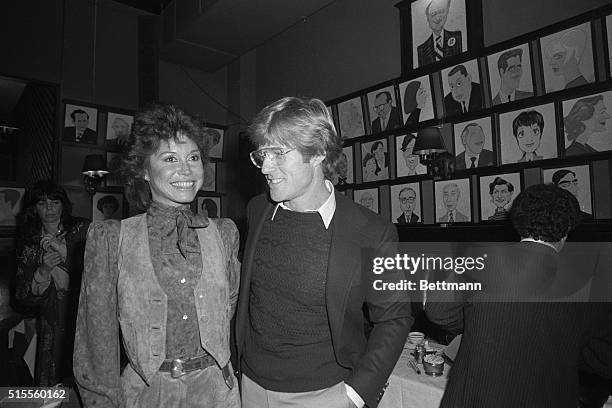 Mary Tyler Moore, star of the film Ordinary People and the movie's director, Robert Redford, chat January 25 at Sardi's during the 45th annual New...