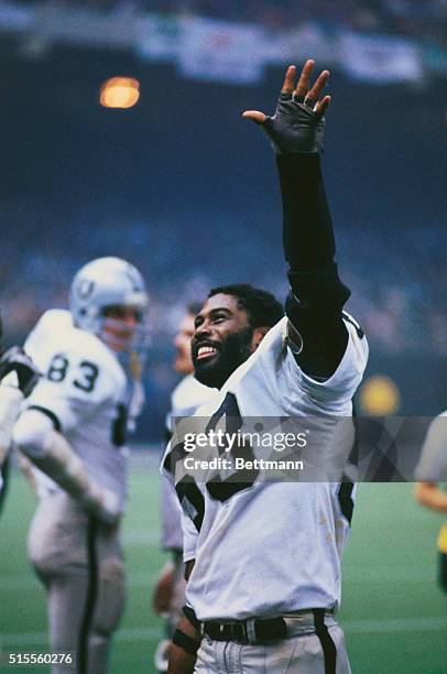 New Orleans: The Oakland Raiders Rod Martin raises his hand in jubilation after setting a Super Bowl record by intercepting three passes in one game.