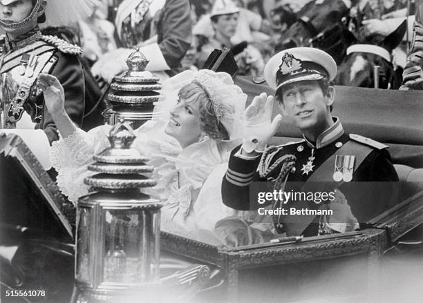 Charles and bride, Lady Diana in coach as they pass through Fleet Street after their wedding at St. Pauls Cathedral.