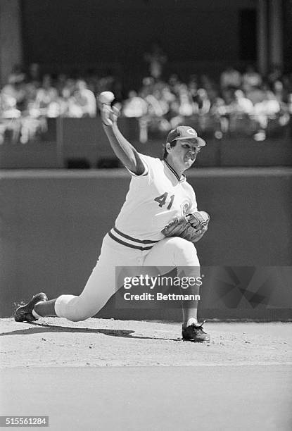 Reds' pitcher Tom Seaver launches strike three here, in the direction of St. Louis' Keith Hernandez, to record the 3,000 strike outs of his career in...