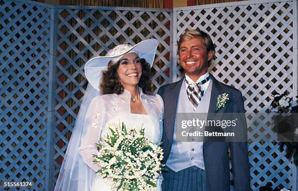 Song stylist Karen Carpenter poses with real estate developer Thomas Burris after they were married at the Beverly Hills Hotel 8/31. During the...