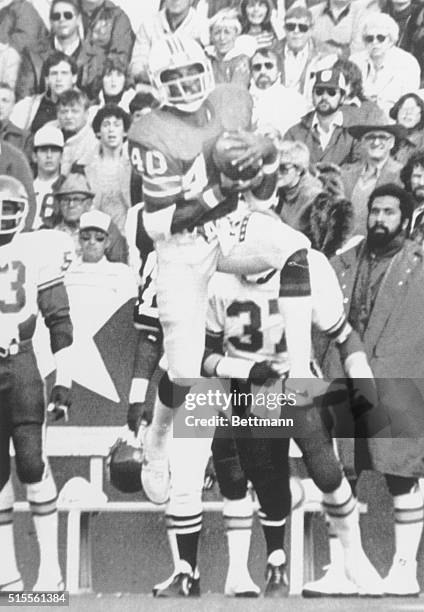 New England defensive back Mike Haynes intercepts a pass from Chiefs' quarterback Joe Delaney during fourth quarter play at Schaefer Stadium in...