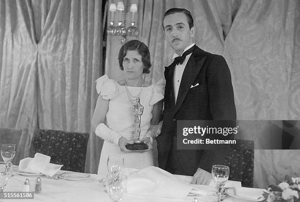 Hollywood: Creator Of "Mickey Mouse" Wins M. P. A. Award. Walt Disney and Mrs. Disney shown as they attended the banquet of the Motion Picture...