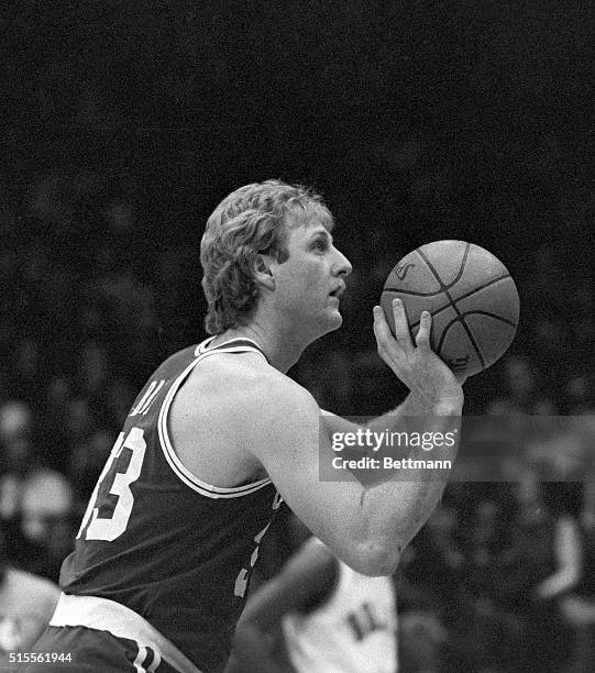 Boston Celtics' Larry Bird takes aim from the line during first half action 1/31. Bird scored 28-points to lead Boston to a 106-83 victory over the...