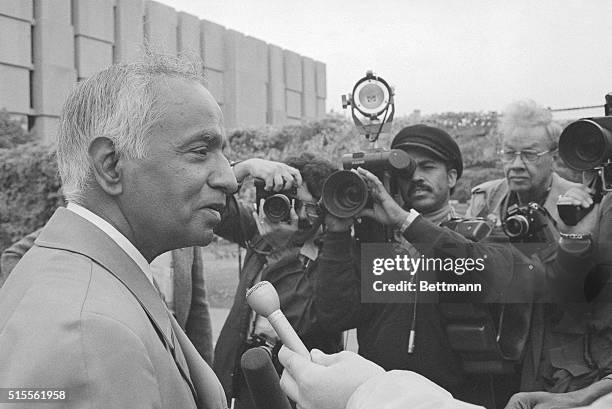 Astro-physicist Subrahmanyan Chandrasekhar of the University of Chicago pauses briefly at the base of the Henry Moore sculpture "Nuclear Energy" on...