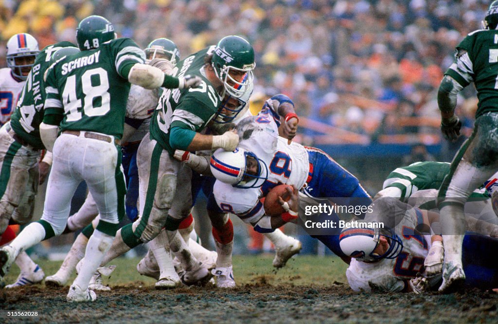 Football Action with Jets and Buffalo Bills Players