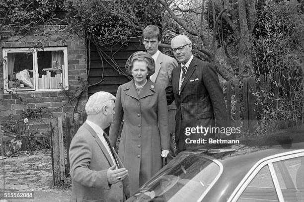 Chequers, England- Prime Minister Margaret Thatcher walks to her car escourted by husband, Denis, after Easter Sunday Church services in her local...