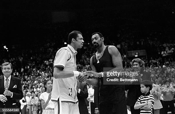 Inglewood, California- LOS Angeles Lakers center Kareem Abdul-Jabbar is congratulated by Wilt Chamberlain during a ceremony 4/6 at the Inglewood...
